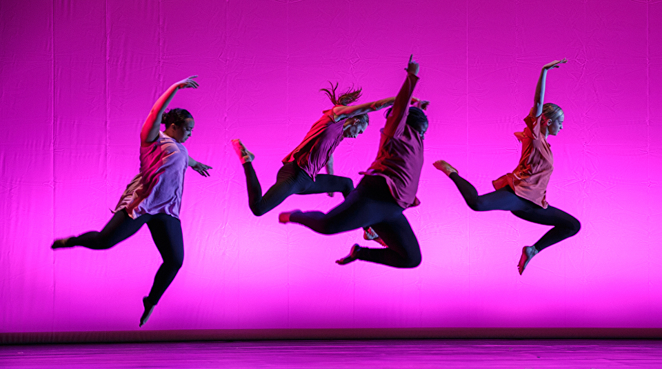 Dancers performing on stage