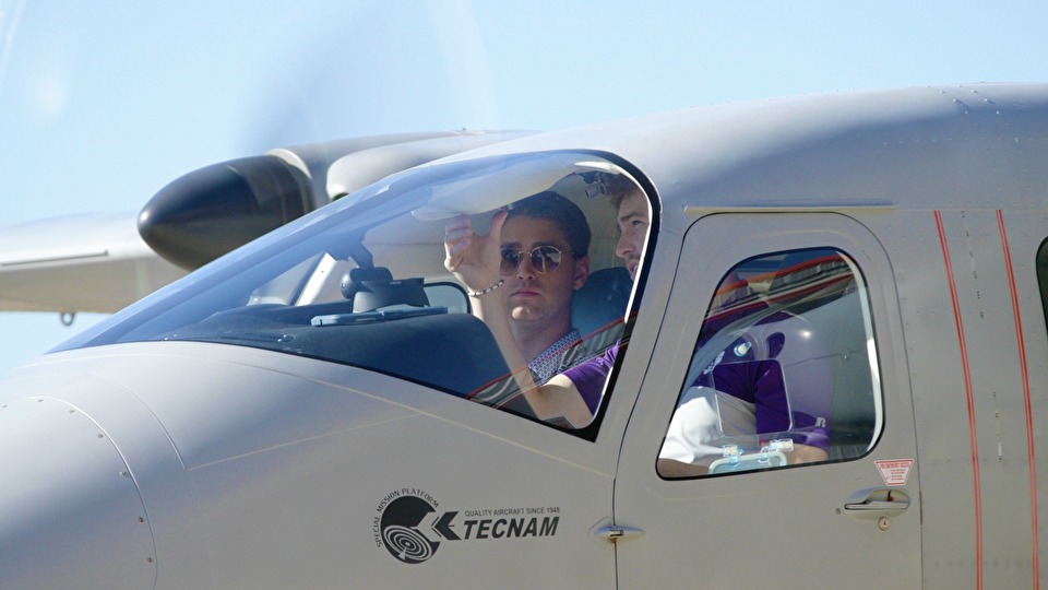 A student and instructor prepare for a flight lesson