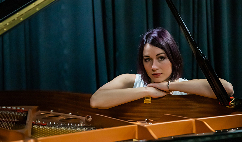 Photo of Mary Katherine Schober at the piano