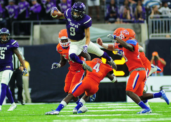 Battle of the Piney Woods football players